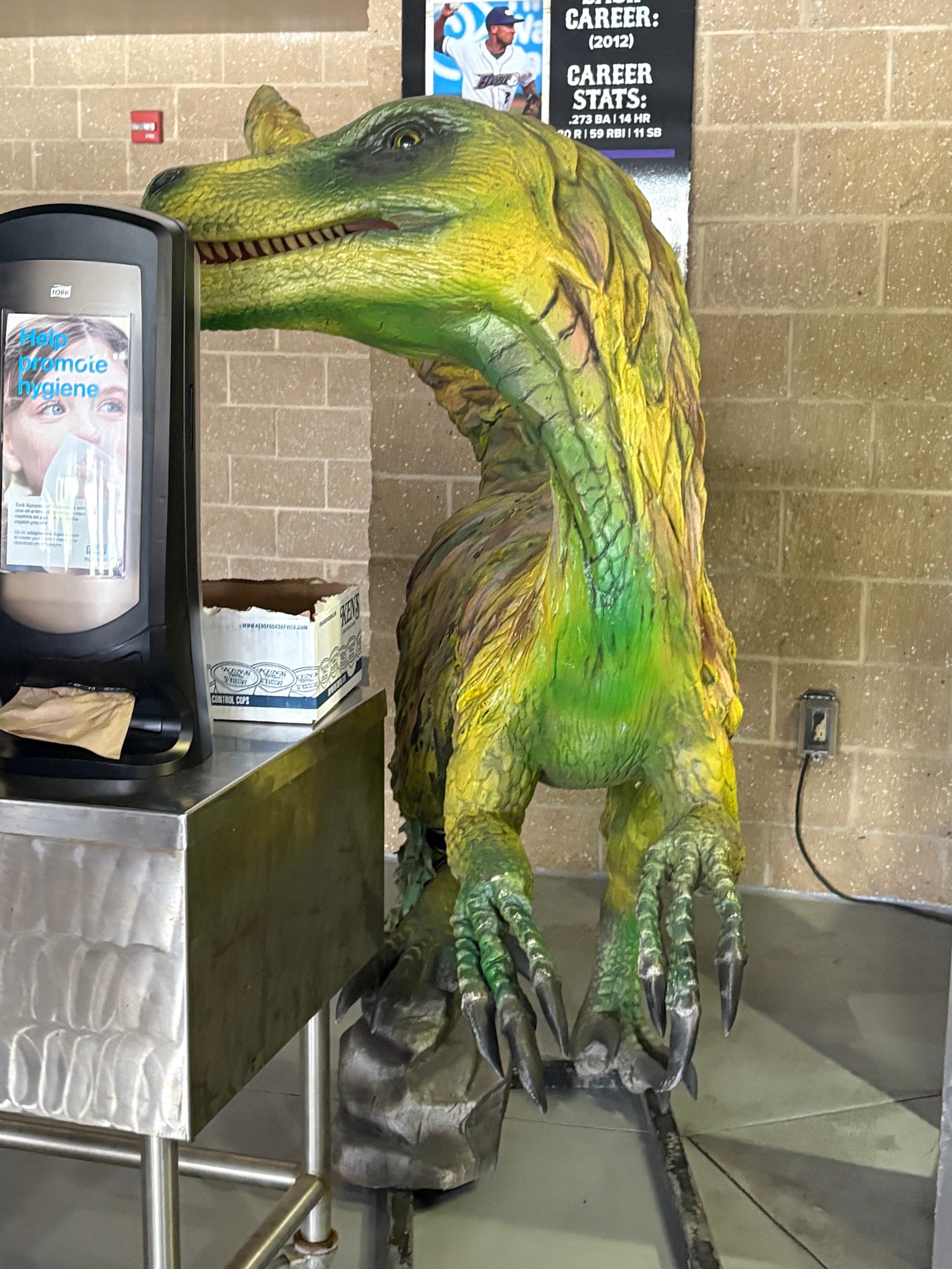 Dinosaur display at a Winston-Salem Dash themed game