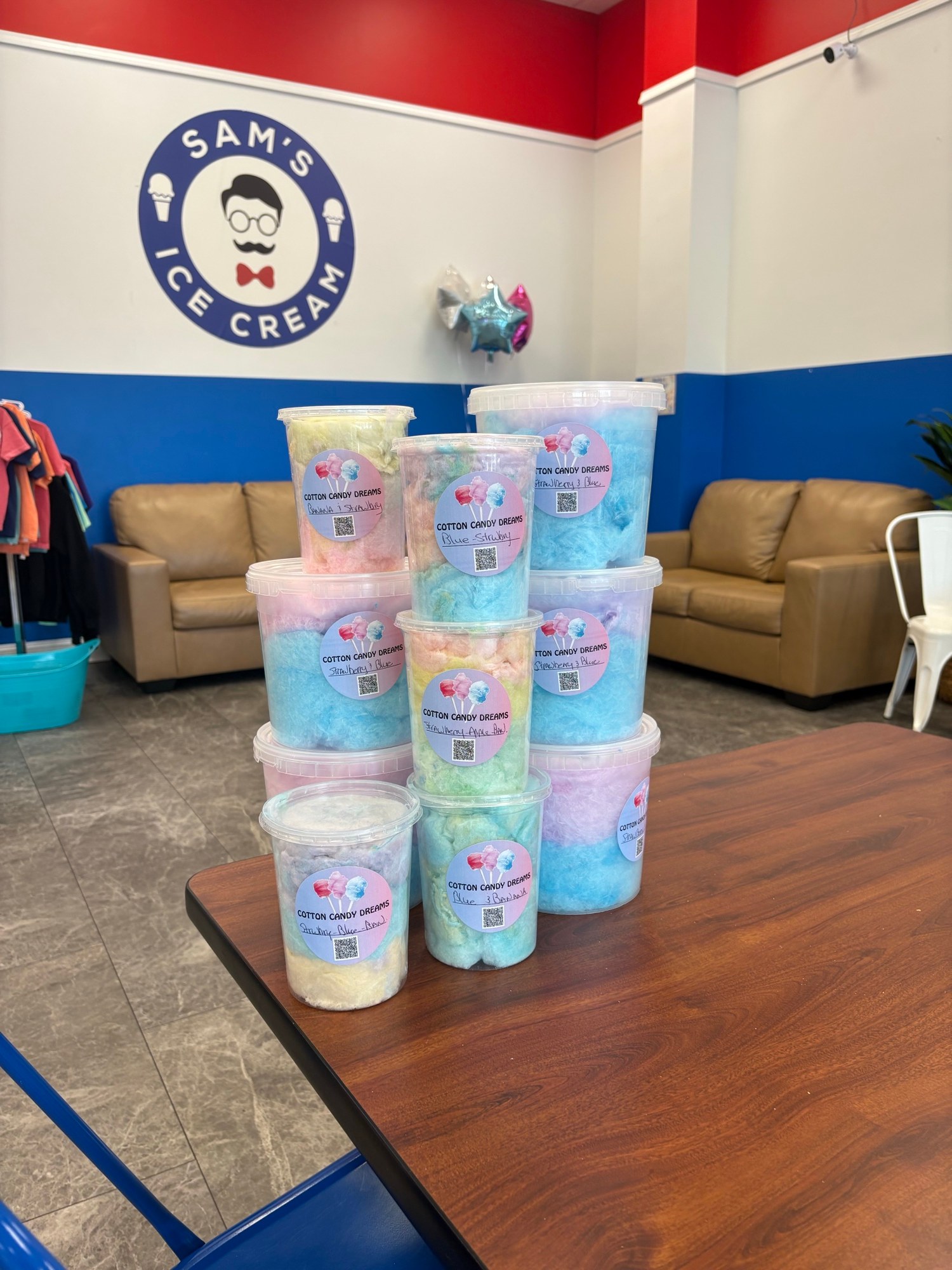 Colorful Cotton Candy Dreams tubs displayed at Sam's Ice Cream